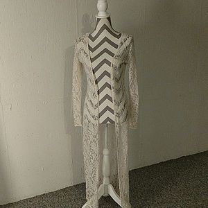 Floor length lace cardigan.